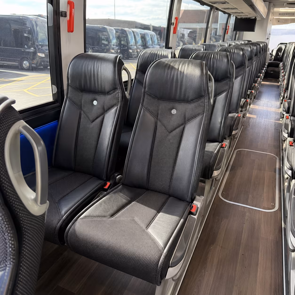 mobile 56 passenger charter bus inside